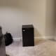One of the only negatives of this room. The awkward placing of the refrigerator on the floor by itself.
