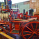 Side view of 19th-century hand-powered pumper