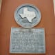Historical medallion on building