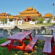 Red picnic tables on temple grounds