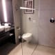 Sink, WC and walk in shower.
