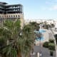 View of lagoon pool and sundeck from Holiday Inn Express terrace.