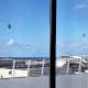 Through the window.