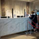 Post COVID-19 reception with screens.