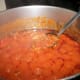 Simmer tomato and ground beef mixture 40 minutes.