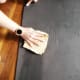Gently wipe down the mat.