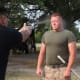 Man uses a can of pepper spray on an attacker