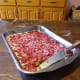 You may add fresh, chopped rhubarb in season, or rhubarb sauce or jam out of season. Jam may fall through the batter, leaving splotchy divets.