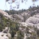 The jumble of boulders beyond the body rock.