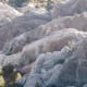 These cliffs were thrust upward by the Punchbowl Fault off the right edge of the canyon. They lean inward in the opposite direction from the Pinyon Fault cliffs.