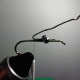First wrap completed, lead wire being re-positioned.