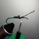 Second wrap completed, lead wire being re-positioned again