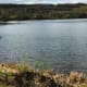 Fine views of the lake from the veranda of the visitor centre. The posts protruding from the water are what remains of the jetty and pontoon.