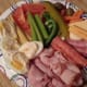 Celery sticks, Hard boiled egg, pickle, cheese, variety of cold cuts ie: chicken, ham, turkey, salami, carrots