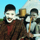 The Xhosa are often called the "red Blanket people are part of the Nguni stock and are made of a diversity of the proud clans of the Pondo, Bomvana, Tembu, , Mfengu and the Xhosa people. Their traditional colors are Red, Orange of Ochre