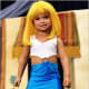 This little prosti-tot was dressed up to look like a little "Pretty Woman" for a pageant shown of Toddlers and Tiaras.
