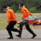 Bodies from Air Asia 8501 wreckage being transported to Surabaya