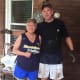 Despite the decimation and chaos, Sherry Cole remained a smiling force throughout the cleanup efforts of her home.