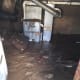 As waters receded, the amount of mud left behind inside homes was a staggering sight.