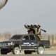 Taliban militants armed with surface to air stinger missiles, guarding the hijacked IC 814