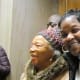 Susie Williams Carter, is with her granddaughter Tonya, after the hearing at the courthouse.