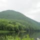 Pine Creek at Waterville, PA, canoes and swim platform in the foreground.