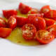 Consuming tomatoes either raw or cooked with olive oil (that's the key) increases blood lycopene levels which helps prevent cancer.