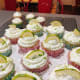 Beautiful decorated lime and coconut cupcakes.