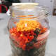 To soak the fruit mixture: In a jar, combine the dried fruits, glazed cherries, and orange zest.