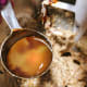 Add the fresh squeezed orange juice.