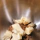 In a stand mixer, combine the butter and dark brown sugar.