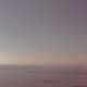 The view of The Statue of Liberty from the observation deck of the World Trade Center, December 1988.