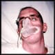 Scott doing therapy to stretch facial skin