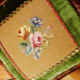 The center of this pillow is needlepoint created by my grandmother.