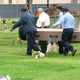 Casket is carried to where grave liner is waiting.