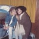 Sarah is shown with one of her friends at a Forest Home winter camp.
