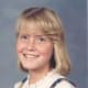 This school picture shows Sarah's ability to smile when she wanted to, and smiling made her beautiful. You will want to constrast this with some of the pictures of Sarah's last year with us and those taken after she left.