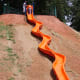 The sliding board goes down the mountain