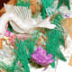 Chile used the most unique materials. This swan is made from dyed horsehair. It comes from a cooperative in Rari, Chile, which is renowned for its miniature horsehair weavings.
