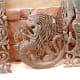 Haiti's delight in music and intimacy with the ocean are shown in this musical mermaid combination. This master artist was taught by a man who made fancy cemetery crosses from recycled metal, which started a whole new industry in Haiti.