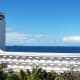 Playground of rich and famous: Umhlanga, Durban North-with ships waiting turn in harbor,