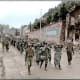 84th Division escorting captured German prisoners.