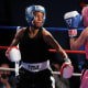 Who would you rather be -- the pink lady or her punchy friend? Someone means business.