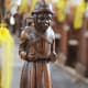 The Pedllar of Swaffham carved in wood,