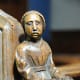 The wife of the Pedlar carved in wood - Swaffham Church