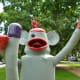 Closeup of “Sock Monkey” sculpture by Joe Barrington in True South sculpture exhibit Houston