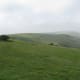 Part of the South Downs Way, towards start of the descent (sign-post by stile)