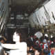Teacher and her students inside a C-124 Globemaster, Korean War Museum, August 1991.