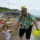 Playing at the beach on Spectacle Island, one of Boston's Harbor Islands, with her Papa