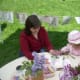 Mother and Daughter coloring together on Lilac Sunday at the Arnold Arboretum